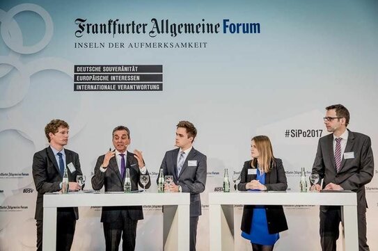 LEIZ scholar Julian Müller-Kaler (center) next to Prof. Michel Friedman at FAZ Forum in Berlin (Source: Klaus Weddig/ FAZ Forum).
