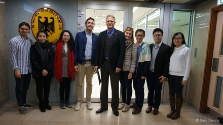 The Transcultural Research Group, joined by local students, meeting German Deputy Consul General Mr. Karsten Tietz (in the middle).