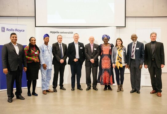 At the Transcultural Leadership Summit, host Prof Josef Wieland, Director of the Leadership Excellence Institute Zeppelin | LEIZ at Zeppelin University (sixth from left), welcomed the speakers, among others, from left to right: Sunil Geness (Director Government Relations and CSR, SAP Africa), Victoria Quaye (CEO NaaviQ Company Limited, Ghana), Dr Bolaji Omitola (Osun State University, Nigeria), Prof. Thaddeus Metz (University of Johannsburg, South Africa), Prof. Derick de Jongh (University of Pretoria, South Africa), Dr Agnes Atim Apea (Founder and CEO of the Hope Development Initiative, Uganda), Andrea Nono (Managing Director MTU South Africa (Pty) Ltd, South Africa), Prof. Stephen Adei (Ashesi University College, Ghana) and Dr Lars Satow (Knowledge Principal Consultant, Knowledge Transfer & Education, SAP SE). (Foto: LEIZ | Maurice Schönen) 