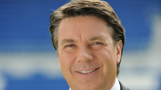 BürgerUniversität mit dem damaligen Geschäftsführer von TSG 1899 Hoffenheim Jochen Rotthaus